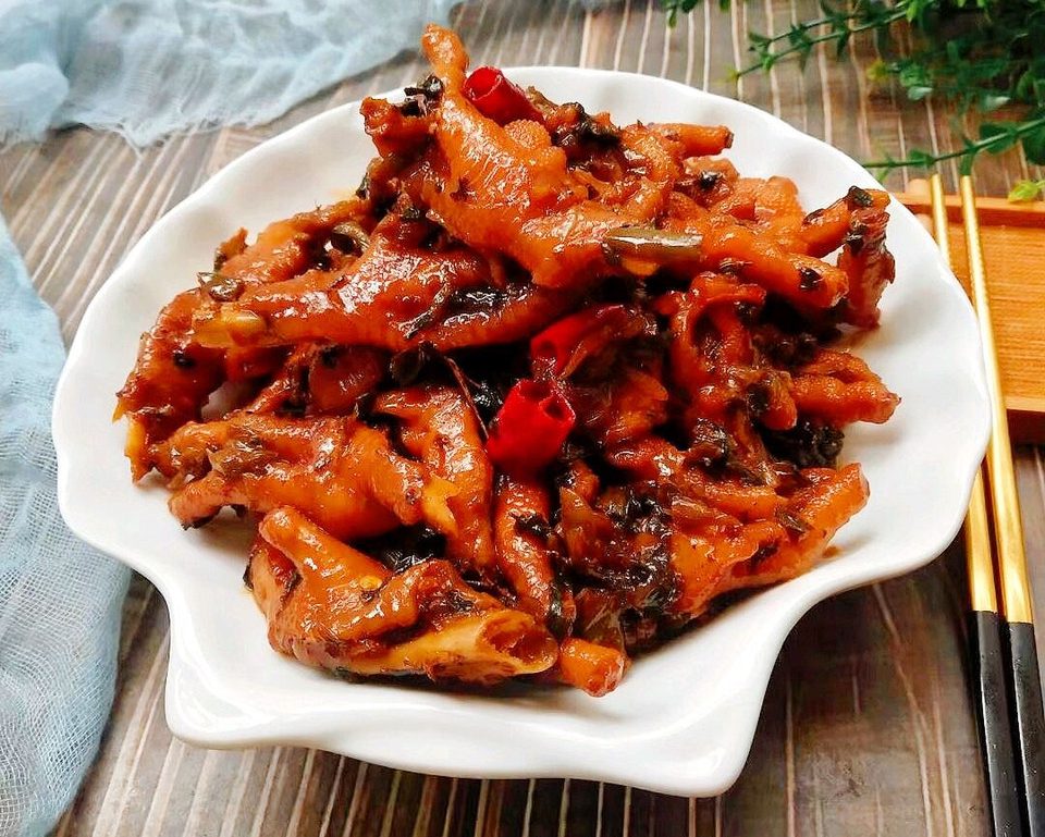 梅干菜鸡爪的做法