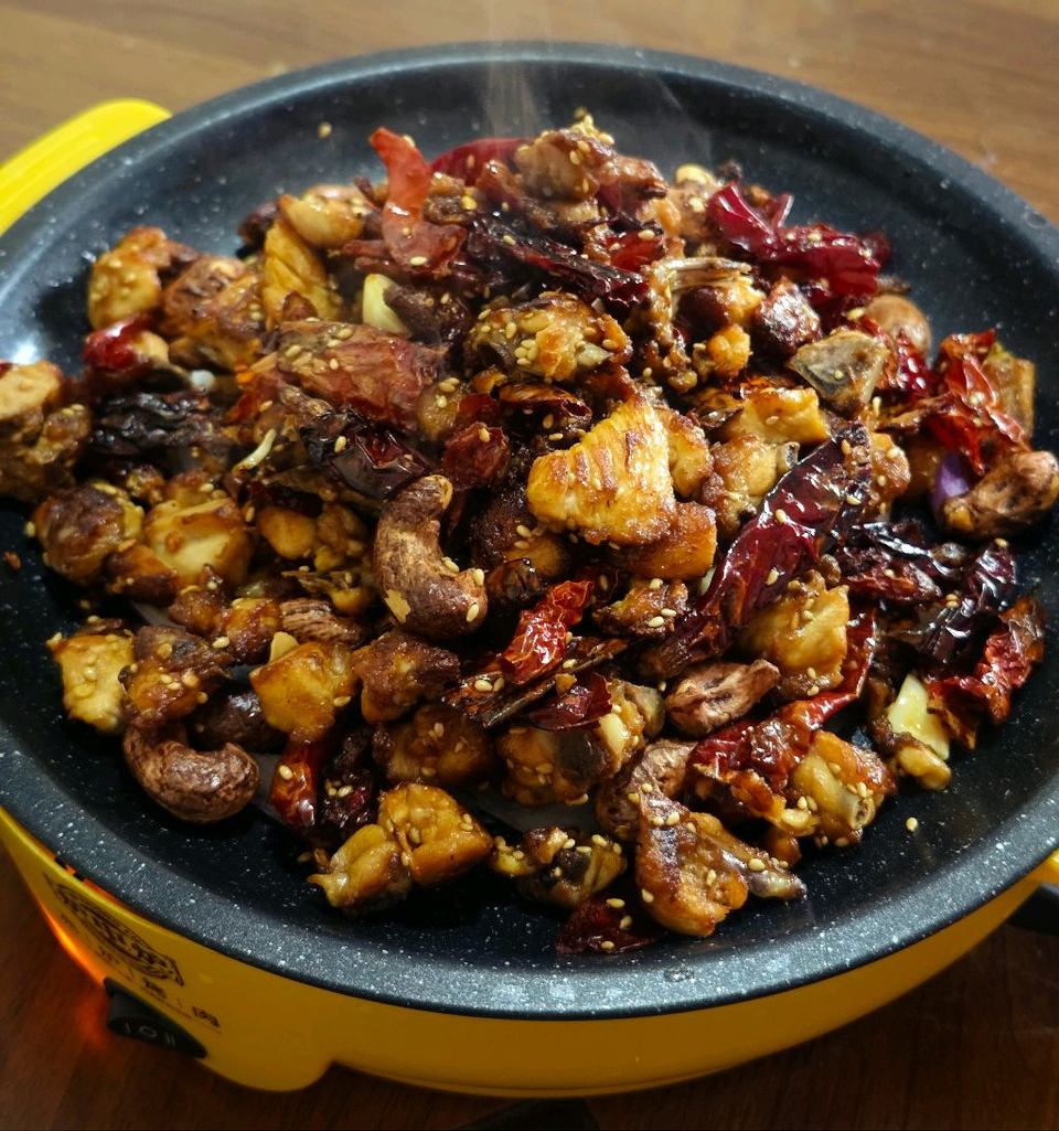 西域坚果辣子鸡的做法